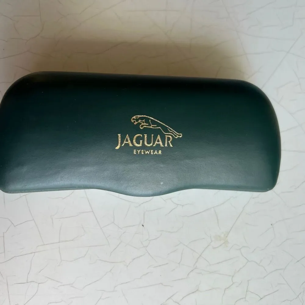 Jaguar dark green hard shell case for  eyeglasses or sunglasses.